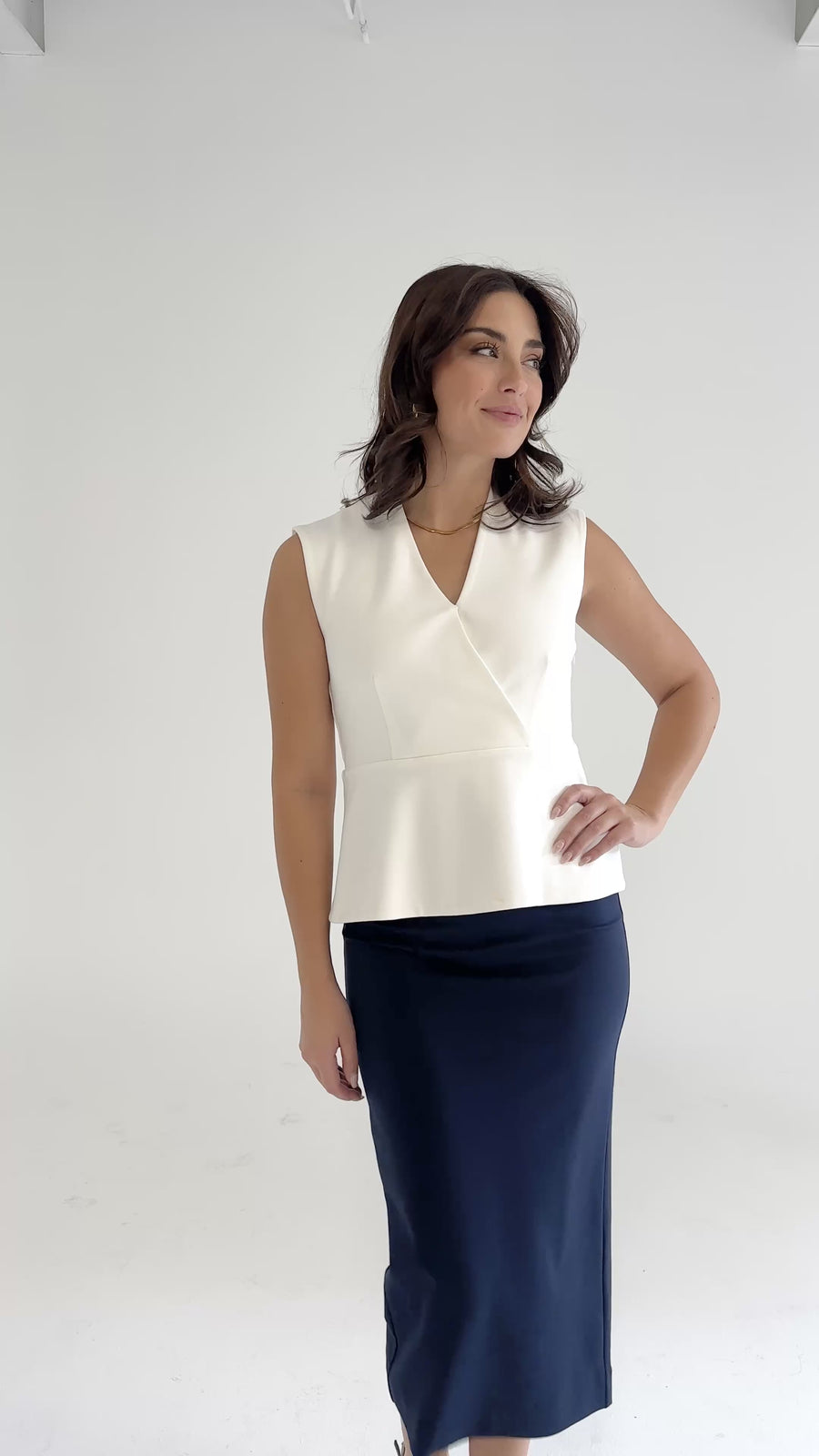 The Clara Peplum Top Ivory